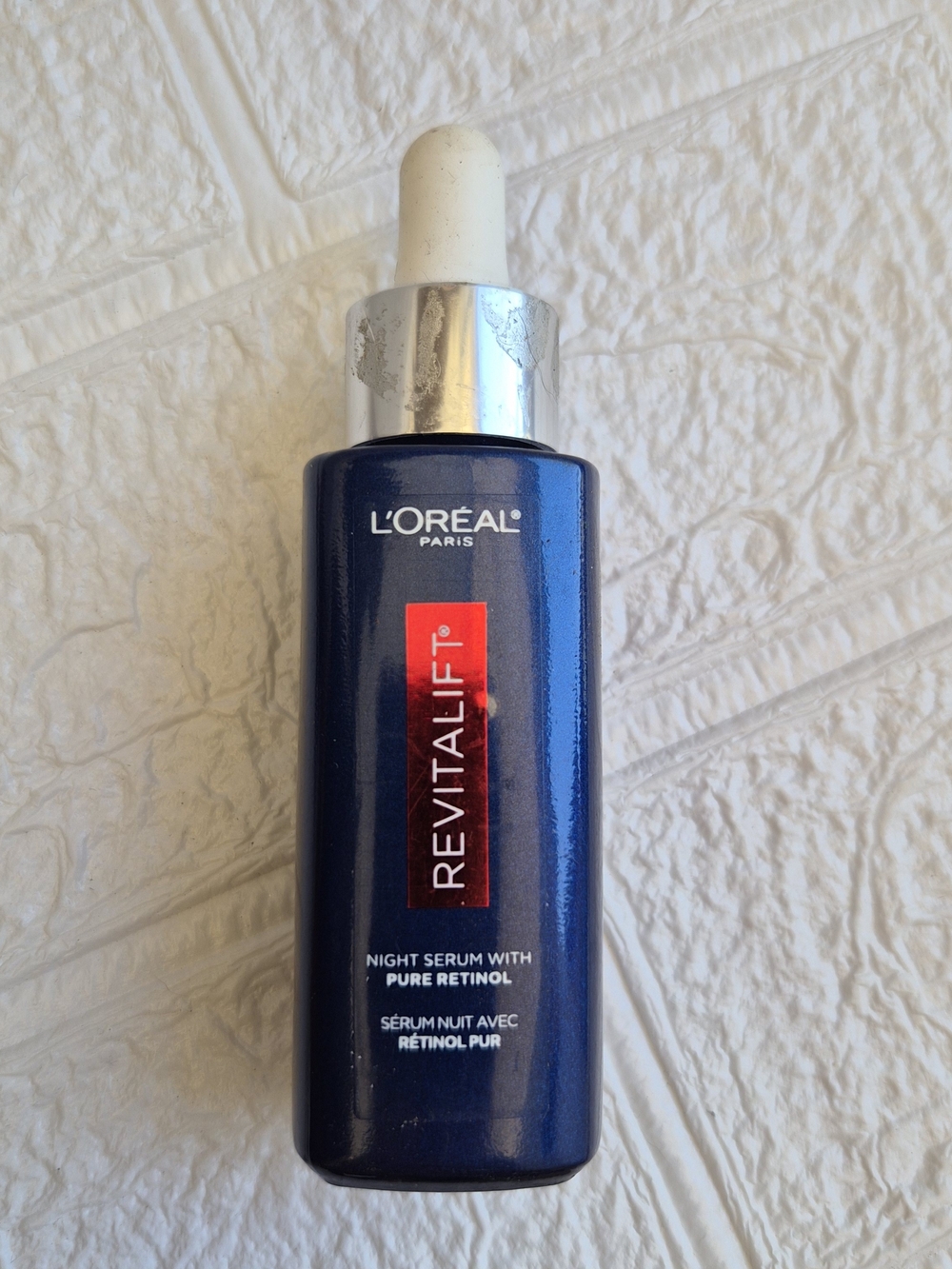 L'Oreal Revitalift Night Serum Bottle - Blue with Red Accent